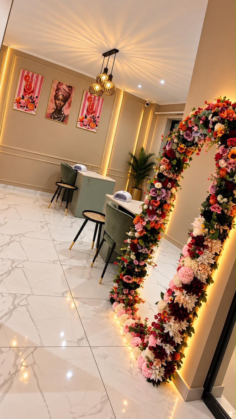 Manicure stations beneath a floral arch at Beauty Emporium