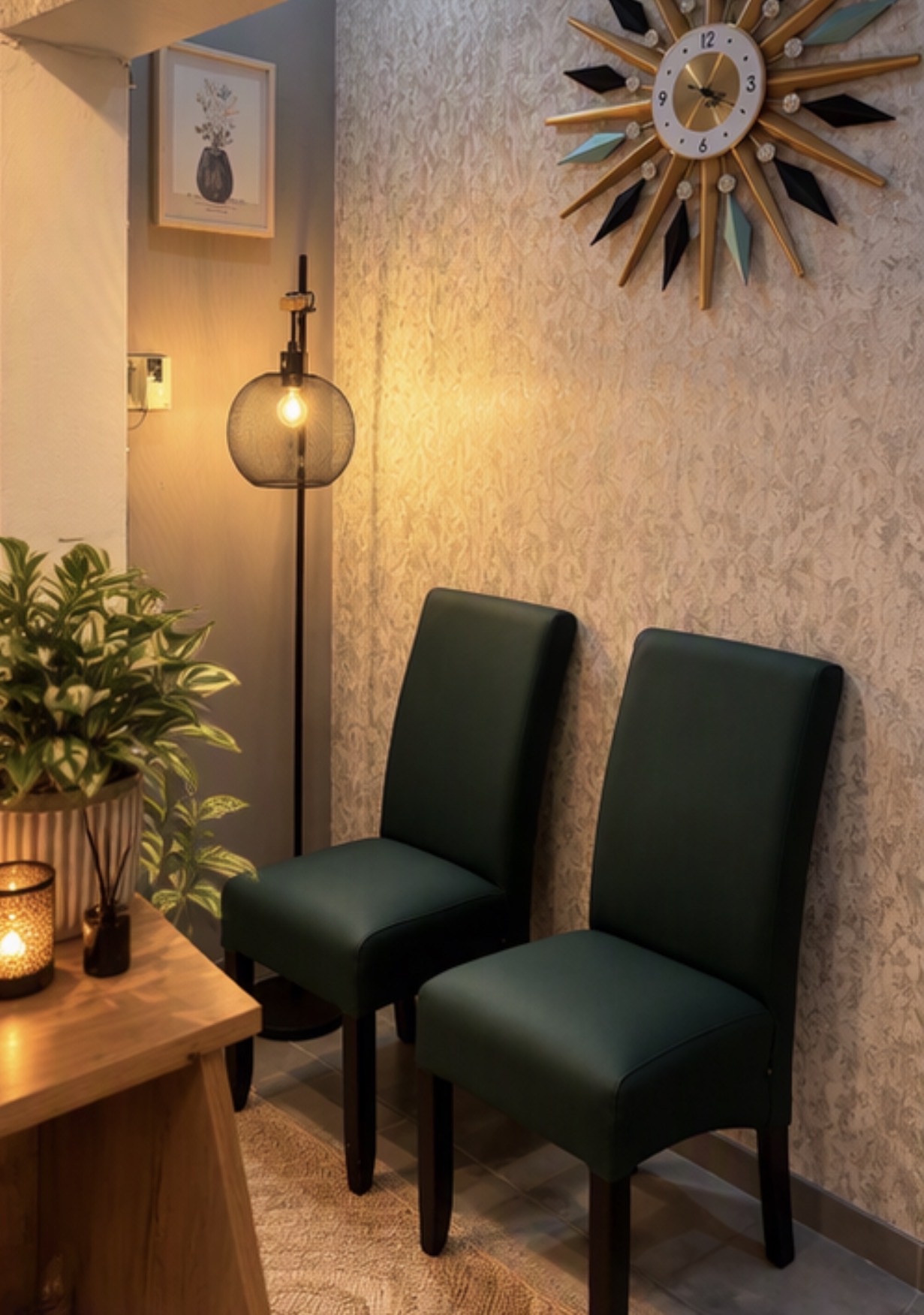 Waiting lounge with green chairs, a warm lamp and a gold sunburst clock